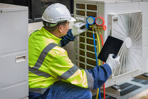 Professional Heat Pump Repair technician working in Bridgeville, DE